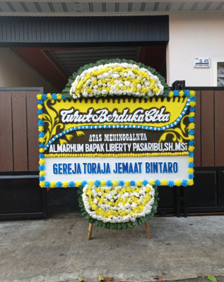 Papan Bunga Duka di Bumi Raya
